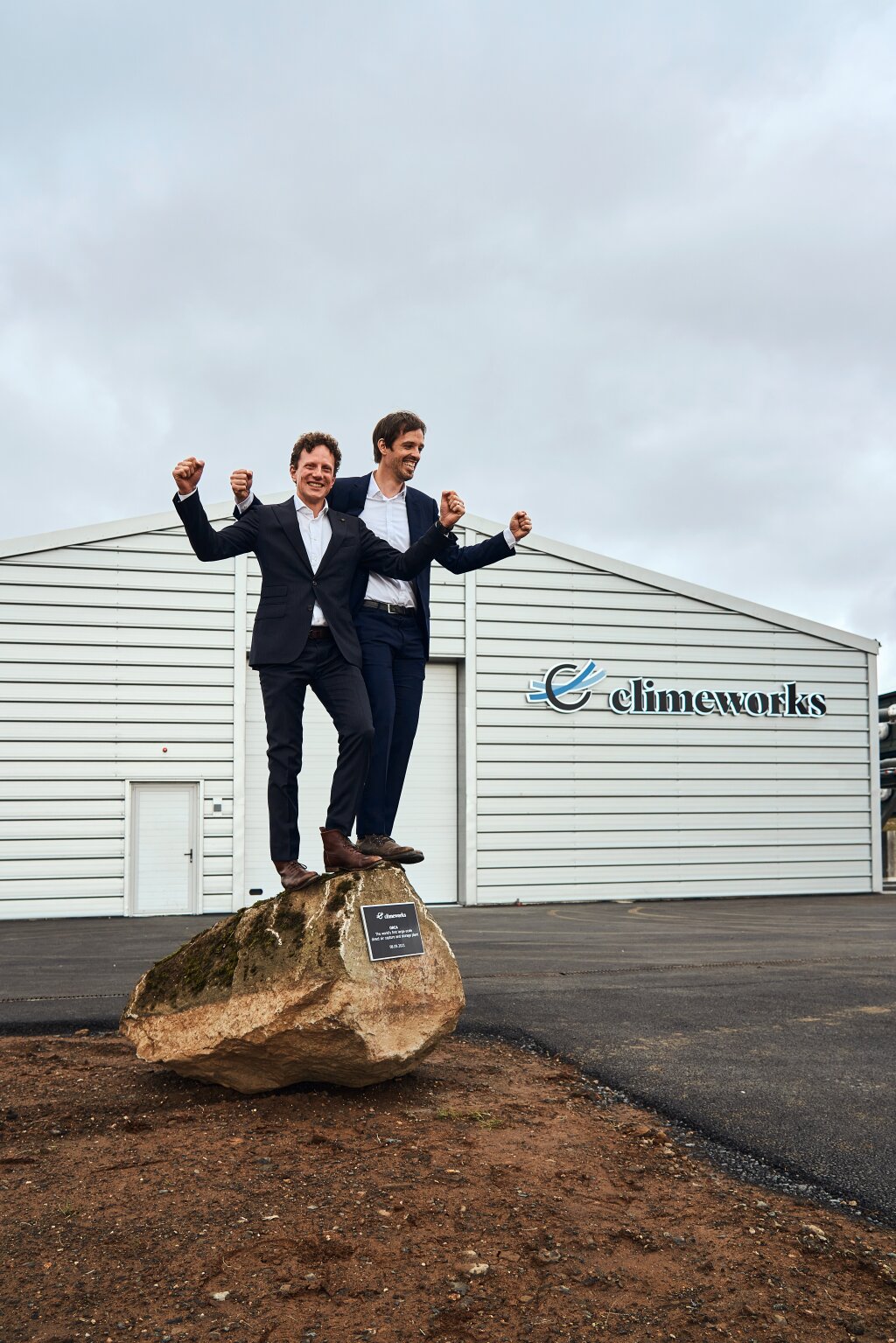 Climeworks founders C. Gebald and J. Wurzbacher in front of Orca plant in Iceland.jpg